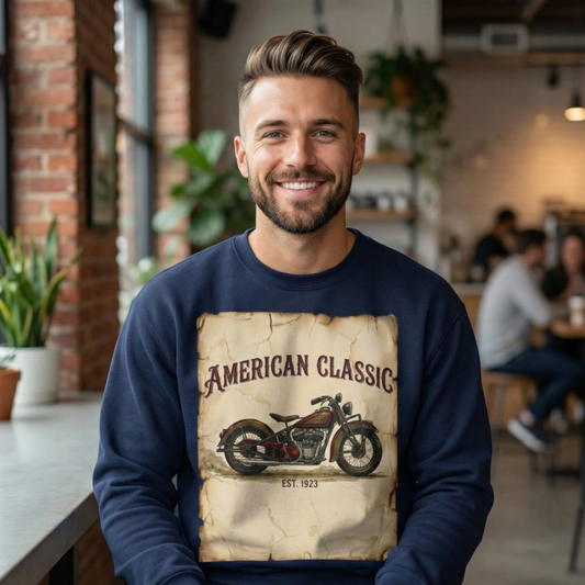 Man wearing a navy blue sweatshirt with 'American Classic' and motorcycle design in a casual setting.