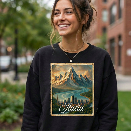 Woman wearing a black sweatshirt with a mountain and city design and 'Italia' text.